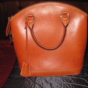 GENUINE LOUIS VUITTON NOMADE LEATHER BAG # M85388